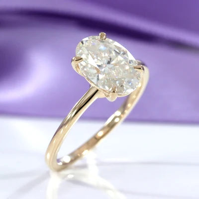 18k yellow gold 2 carat oval lab diamond solitaire engagement rings Quorri