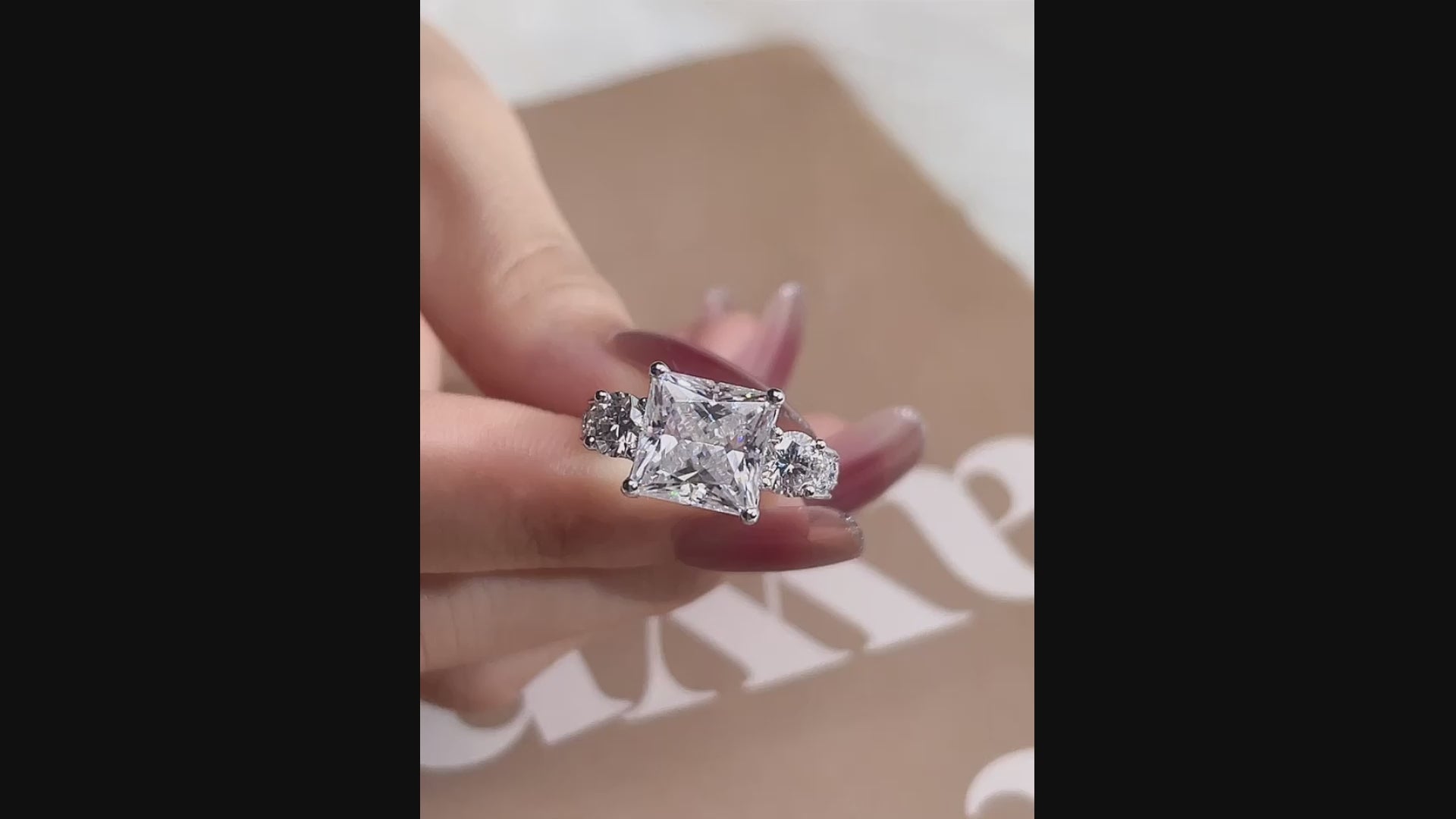 vera wang inspired white gold 4 carat princess and round three stone lab diamond engagement ring Quorri