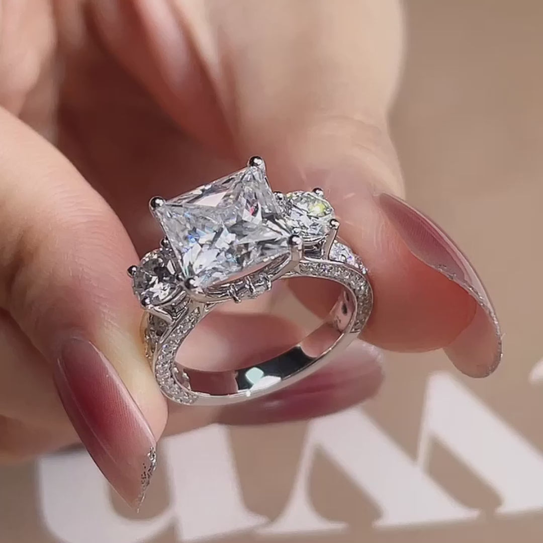 Vera Wang inspired white gold 4 carat princess and round three stone lab diamond engagement ring Quorri