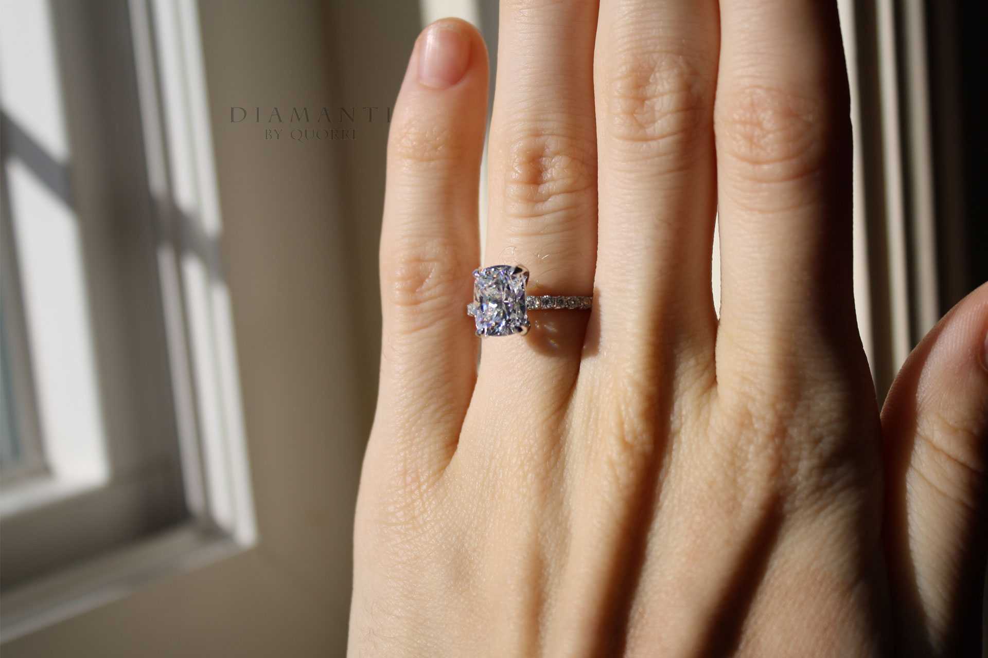 engagement ring with moissanite elongated cushion diamonds