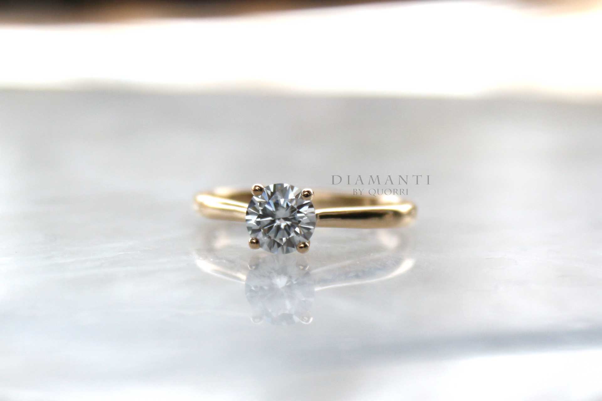 petite lab grown diamond solitaire ring in yellow gold
